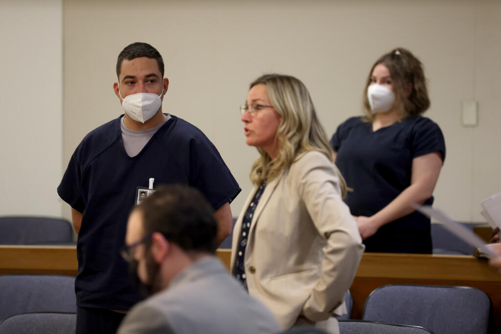 Evan Frostick, 26, left, and Madison Bernard, 23, right, both charged with murder and child cruelty in the May 9 death of their daughter, Charlotte Frostick, appear before a judge Thursday, Sept. 1, 2022, at the Sonoma County Superior Court in the Hall of Justice in Santa Rosa, California. (Beth Schlanker/The Press Democrat)