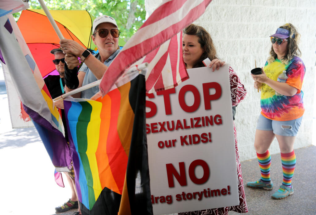 Supporters and protesters of the Drag Story Hour gather outside the Windsor Regional Library in Windsor, Sunday, June 18, 2023. (Beth Schlanker / The Press Democrat file)