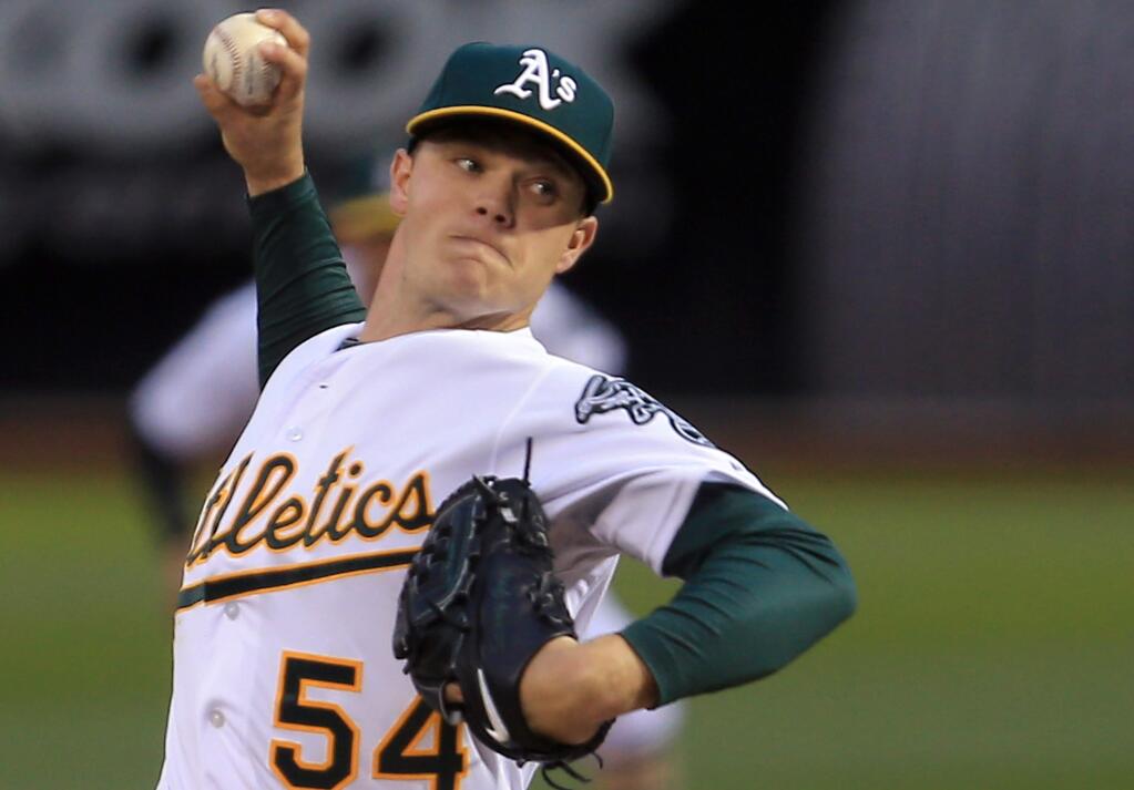 Sonny Gray pitches against the Texas Rangers, allowing no hits in to the eighth inning Monday April 6, 2015 at the Oakland Coliseum in Oakland. The A's beat Ranger 8-0. (Kent Porter / Press Democrat) 2015