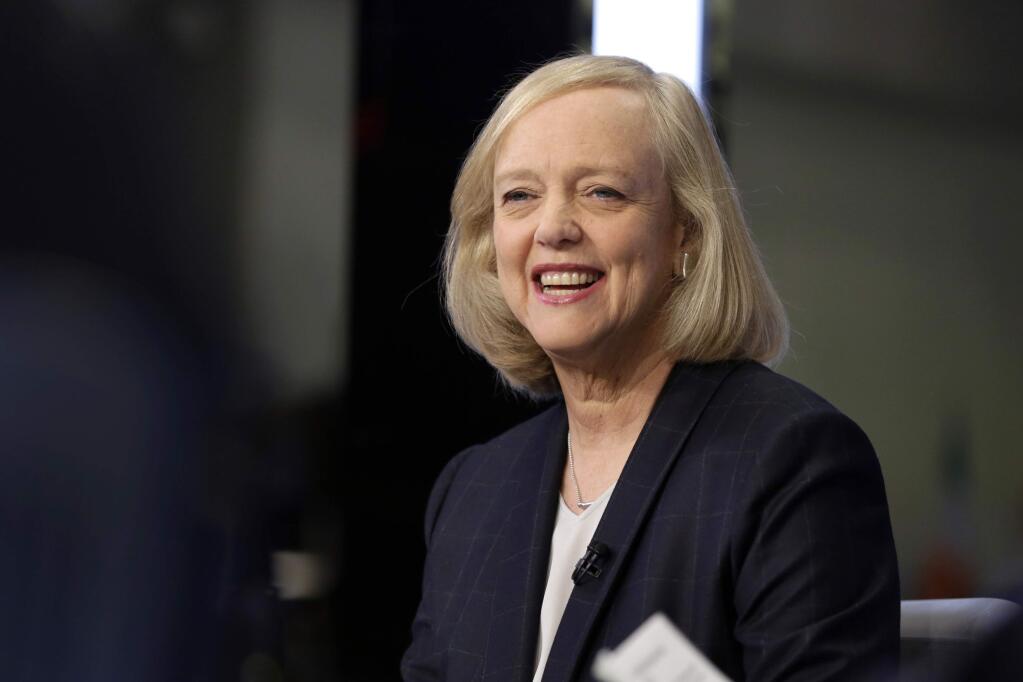 FILE - In this Nov. 2, 2015 file photo, Hewlett Packard Enterprise President and CEO Meg Whitman is interviewed on the floor of the New York Stock Exchange. Top Republican donor and fundraiser Whitman is endorsing Democrat Hillary Clinton for president, saying she cannot support a candidate who has 'exploited anger, grievance, xenophobia and racial division.' The Hewlett-Packard executive says in a statement Tuesday night, Aug. 2, 2016, that Republican nominee Donald Trump's 'demagoguery has undermined the fabric of our national character.' (AP Photo/Richard Drew, File)