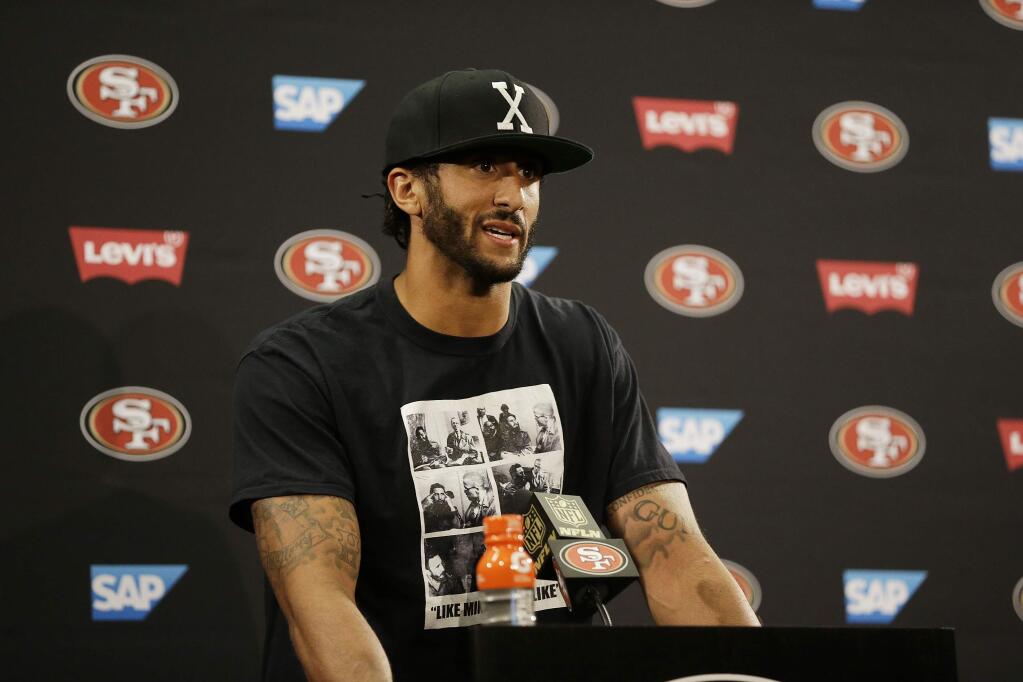 San Francisco 49ers quarterback Colin Kaepernick answers questions at a news conference after a game against the Green Bay Packers Friday, Aug. 26, 2016, in Santa Clara. Green Bay won the game 21-10. (AP Photo/Ben Margot)