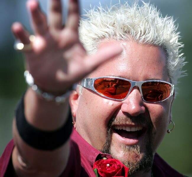 5/20/2007: B6: ABOVE: Santa Rosa restaurant owner Guy Fieri, who has made the big time on The Food Network, serves as the parade's Grand Marshal.PC: News/--Santa Rosa's own Guy Fieri a, local chef who has made the big time on The Food Network, is the Grand Marshal of the 113th Annual Luther Burbank Rose Parade and Festival, Saturday May 19, 2007 in Santa Rosa. (Kent Porter / The Press Democrat) 2007