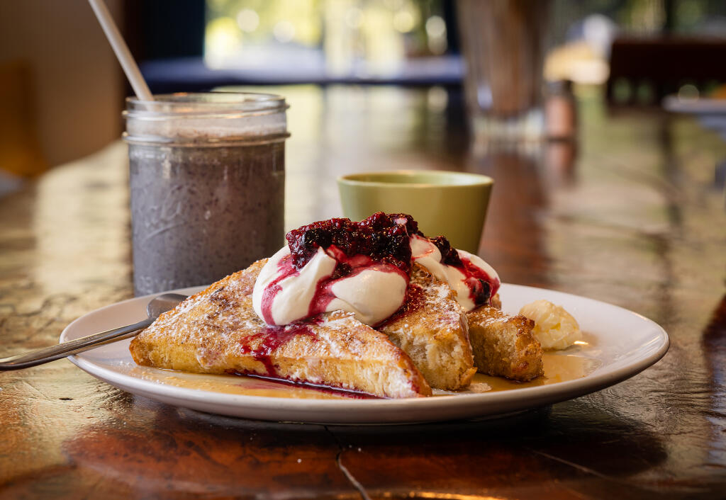 Baked and toasted French toast with strawberry sauce and vanilla cream with a plant-based protein smoothie from Baked on the River in Guerneville, Friday, Jan. 5, 2024. (John Burgess / The Press Democrat)