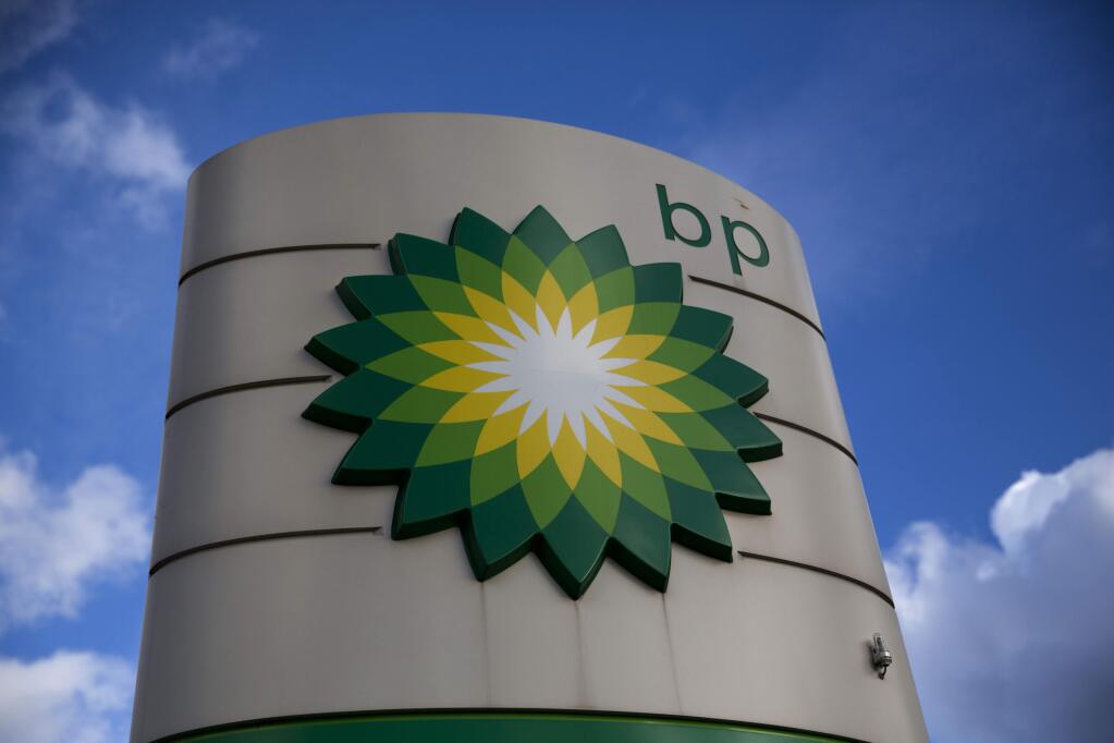 FILE - This Thursday, Jan. 15, 2015 file photo shows a BP logo outside a petrol station in the town of Bletchley in Buckinghamshire, England. (AP Photo/Matt Dunham, File)