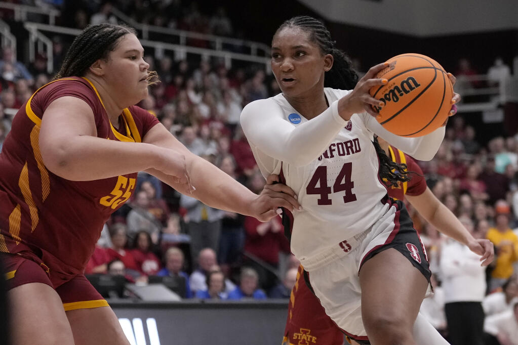 Stanford forward Kiki Iriafen (44) drives to the basket against Iowa State center Audi Crooks during the second half of a second-round college basketball game in the women's NCAA Tournament in Stanford, Calif., Sunday, March 24, 2024. (AP Photo/Jeff Chiu)