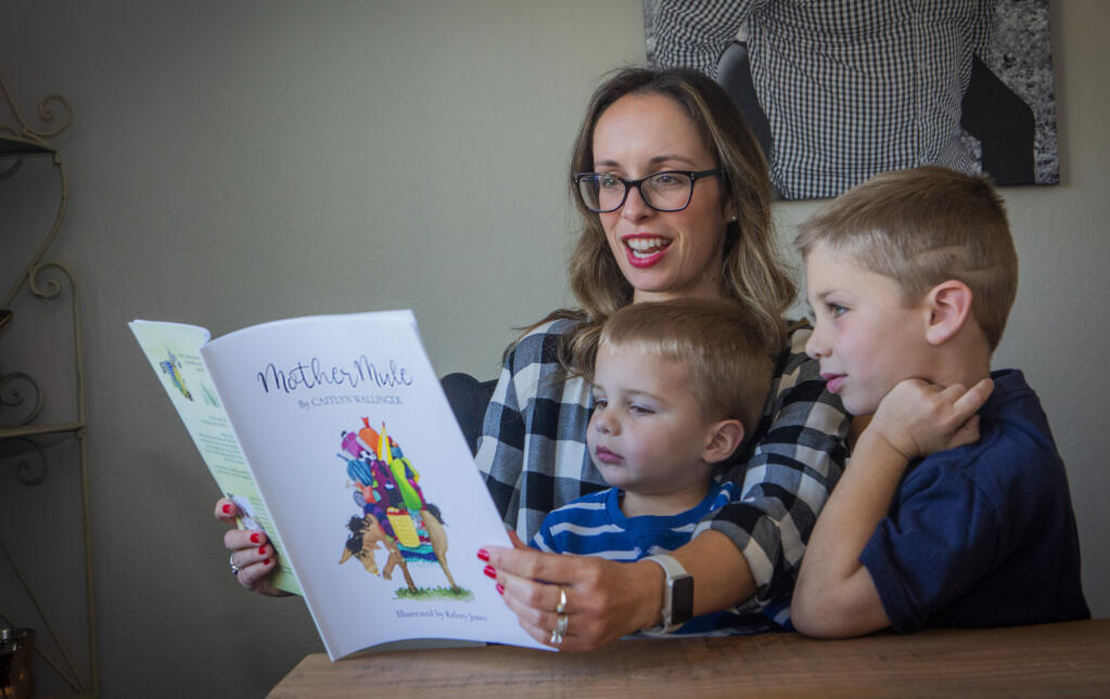 Caitlyn Wallinger, author of ’Mother Mule,’ with her sons Levi, 3, and Max 6. (Photo by Robbi Pengelly/Index-Tribune)