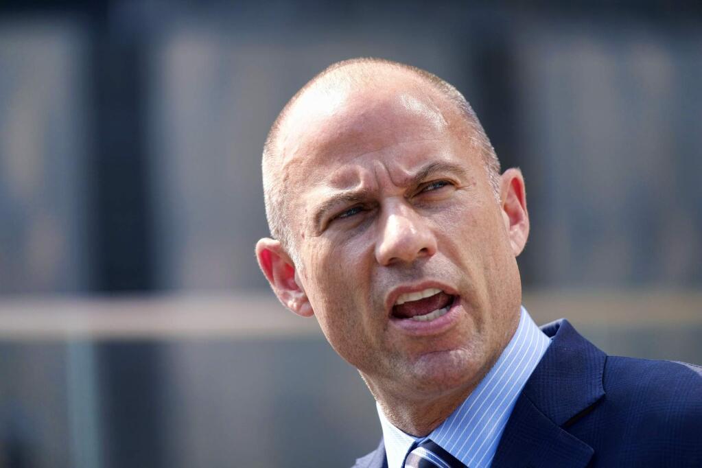 FILE - In this Friday, July 27, 2018 file photo, Michael Avenatti, the attorney for porn actress Stormy Daniels talks to the media during a news conference in front of the U.S. Federal Courthouse in Los Angeles.(AP Photo/Richard Vogel, File)