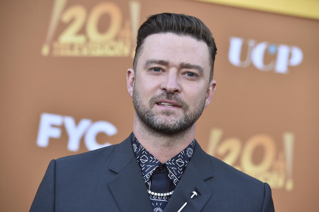 Justin Timberlake arrives at the Los Angeles premiere of "Candy," May 9, 2022 at El Capitan Theatre. (Photo by Jordan Strauss/Invision/AP)