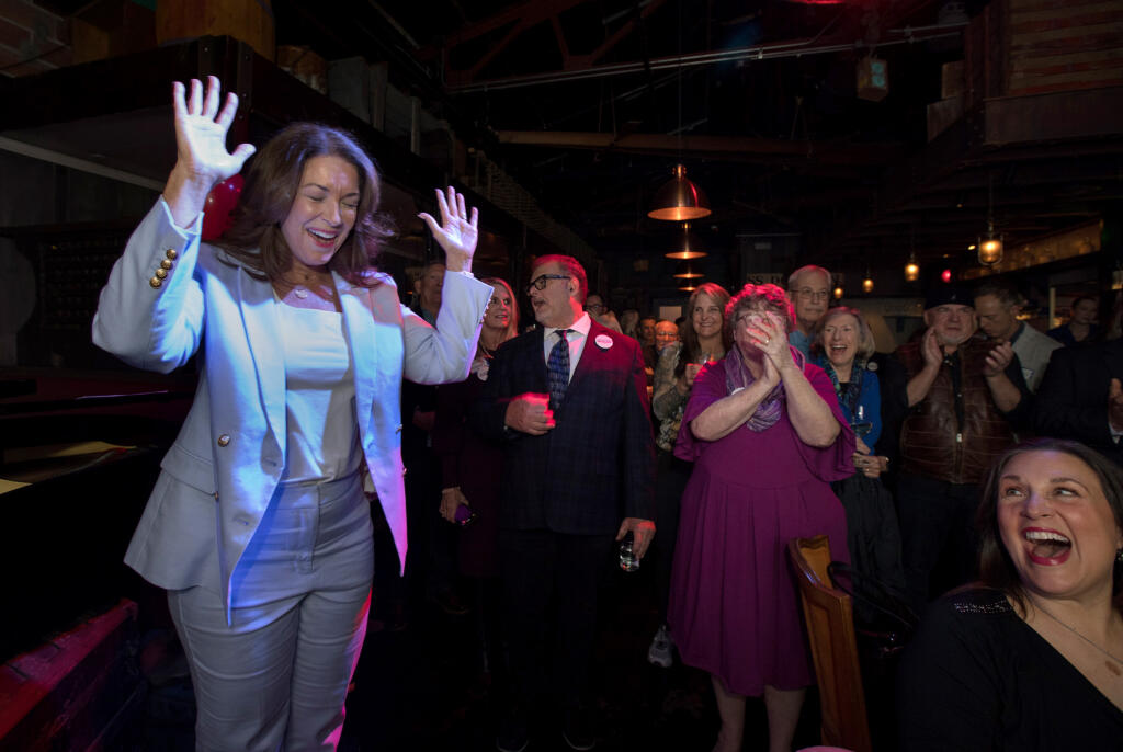 Liz Alessio, candidate for Napa County Board of Supervisors District 2, celebrates with her supporters after she is the projected winner at her election night party at The Fink in Napa, Tuesday, March 5, 2024. (Darryl Bush / For The Press Democrat)