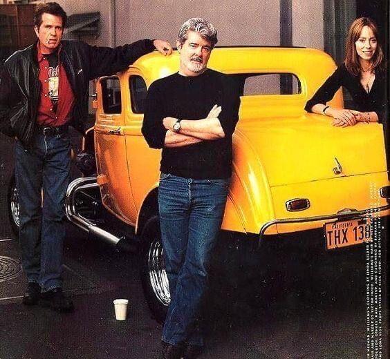 Paul LeMat, George Lucas and Mackenzie Phillips with the ‘32ndeuce coup they drove around Petaluma in in the film “American Graffiti.” (COURTESY OF MACKENZIE PHILLIPS)