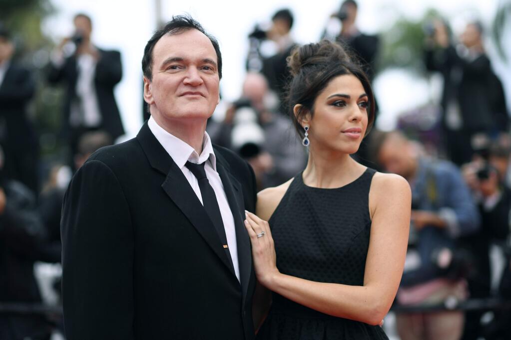 FILE - In this May 18, 2019 file photo, film director Quentin Tarantino and his wife Daniela Pick pose for photographers upon arrival at the premiere of the film 'The Wild Goose Lake' at the 72nd international film festival, Cannes, southern France. Tarantino is about to become a father. His representative Katherine Rowe says the ‚ÄúOnce Upon a Time... In Hollywood‚Äù director and his wife, Israeli model and singer Pick, are expecting a baby. The couple met in 2009 and married last November. It‚Äôs the first child for the 56-year-old Tarantino, who also directed ‚ÄúPulp Fiction‚Äù and ‚ÄúReservoir Dogs,‚Äù and the 35-year-old Pick. (Photo by Arthur Mola/Invision/AP, File)