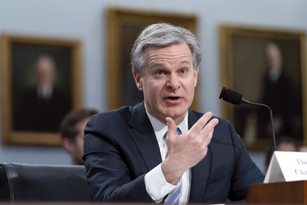 FILE - FBI Director Christopher Wray testifies before the House Appropriations subcommittee Commerce, Justice, Science, and Related Agencies budget hearing for Fiscal Year 2024, on Capitol Hill in Washington, April 27, 2023. The years-long feud between congressional Republicans and the FBI is reaching a new level of rancor. Lawmakers are preparing a resolution to hold FBI director Christopher Wray in contempt of Congress. House Oversight Committee chairman James Comer has scheduled a vote on the contempt resolution for Thursday. (AP Photo/Jose Luis Magana, File)
