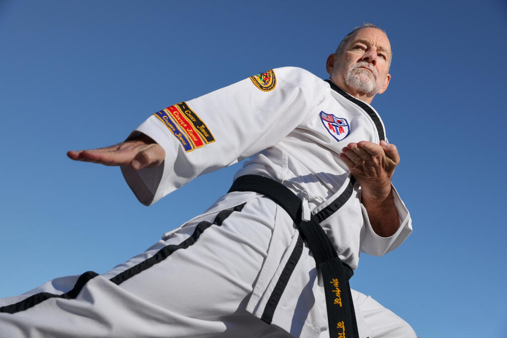 John D’Anna, senior news director at The Press Democrat, is a fifth degree blackbelt in taekwondo, which he has been practicing for nearly 40 years. Photo taken in Santa Rosa on Thursday, September 1, 2022. (Christopher Chung/The Press Democrat)
