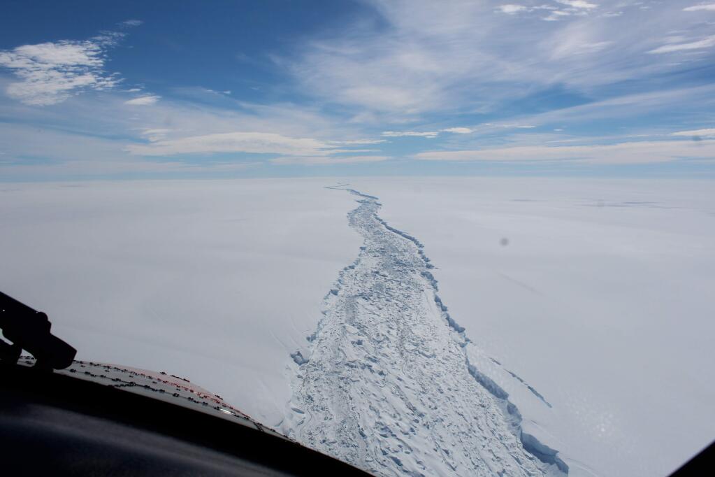 This is a Feb. 2017 image of the Larsen C ice shelf in Antarctica made available by the Antarctic Survey on Wednesday July 12, 2017. A vast iceberg with twice the volume of Lake Erie has broken off from a key floating ice shelf in Antarctica, scientists said Wednesday. The iceberg broke off from the Larsen C ice shelf, scientists at the University of Swansea in Britain said. The iceberg, which is likely to be named A68, is described as weighing 1 trillion tons (1.12 trillion U.S. tons). (British Antarctic Survey via AP)