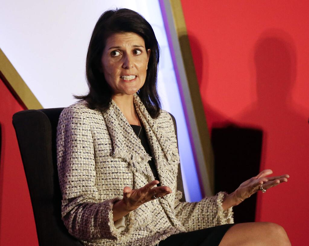FILE - In this Nov. 15, 2016 file photo, South Carolina Gov. Nikki Haley speaks in Orlando, Fla. President-elect Donald Trump says he intends to nominate Haley to be the next U.S. ambassador to the United Nations. (AP Photo/John Raoux, File)