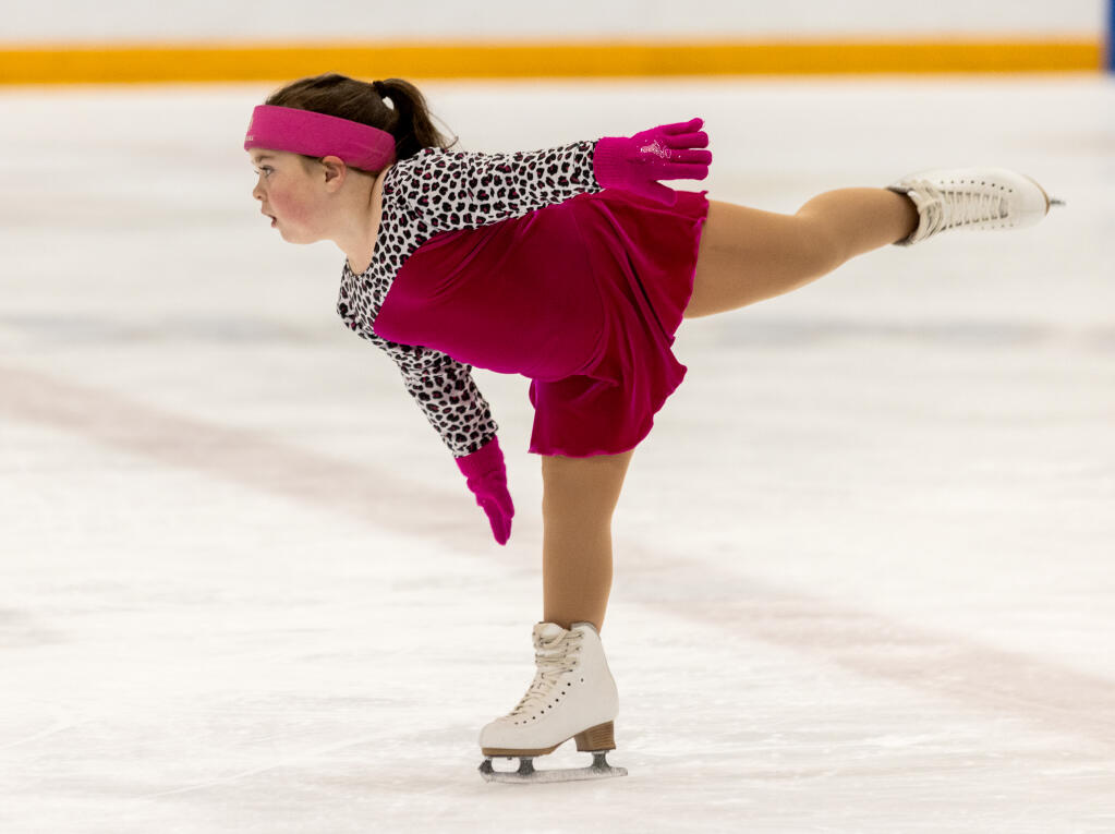 Abigail Conner, 7, practices her routine for the Scott Hamilton CARES Foundation Sk8 to Elimin8 Cancer Celebration Ice Show at Snoopy’s Home Ice in Santa Rosa, Thursday, Oct. 30, 2023.  (John Burgess / The Press Democrat)