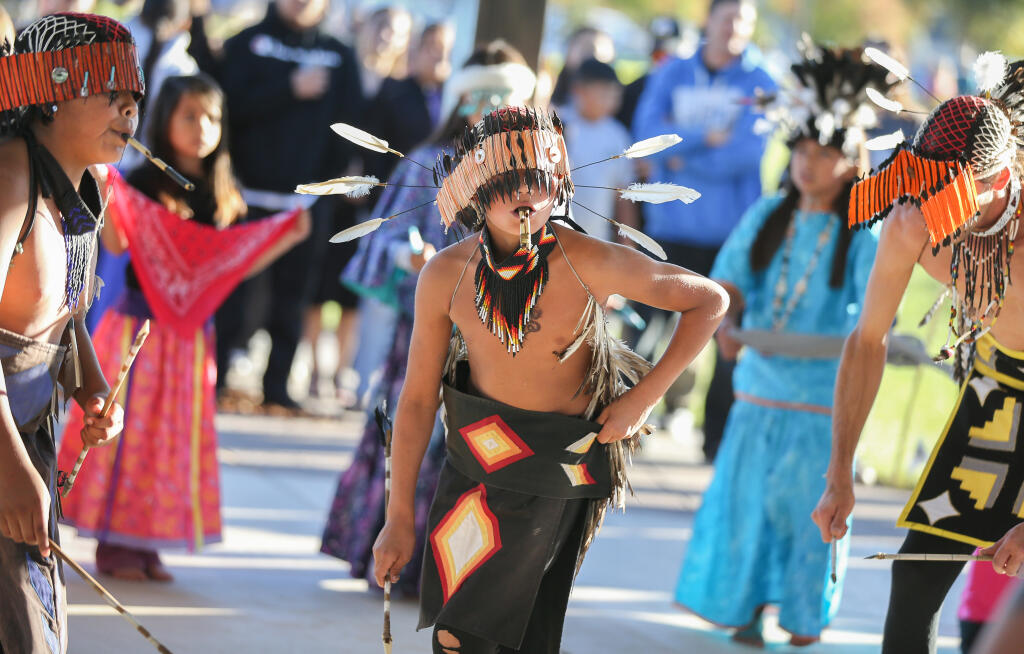 Eddie Medders dances with Xa-Ben-Na-po Dancers of Big Valley Band of Pomo Indians and Ye-Ma-Bax Dancers of Scotts Valley Band of Pomo Indians as they perform traditional dances during the Xabatin Community Park grand opening ceremony in Lakeport, Thursday, Oct. 26, 2023. (Christopher Chung / The Press Democrat)