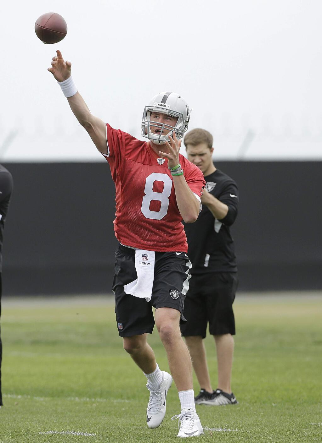 Oakland Raiders' Connor Cook throws during rookie minicamp in Alameda, CFriday, May 13, 2016. (AP Photo/Jeff Chiu)