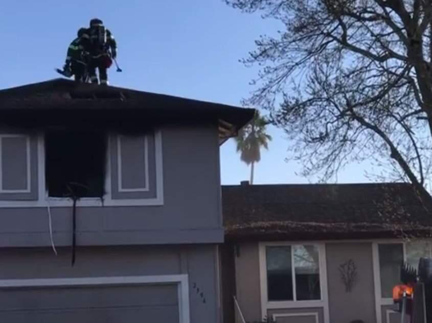 A screenshot from video shared on Facebook by the Santa Rosa Fire Department shows firefighters at the scene of a house fire in Santa Rosa on Monday, Feb. 3, 2020. (SANTA ROSA FIRE DEPARTMENT/ FACEBOOK)