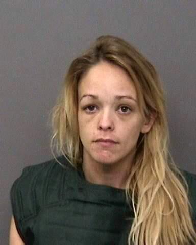 This undated booking photo provided by the Shasta County Sheriff shows Michelle Watkins, 33, of Junction City, Calif. Anderson police arrested Watkins on Tuesday, Sept. 5, 2017 after a man reported that he found her sleeping naked in his bed. The man, who police declined to identify, said he didn't know the woman and shocked to find her in his home. She is being held on suspicion of burglary and her bail is $25,000. (Shasta County Sheriff via AP)