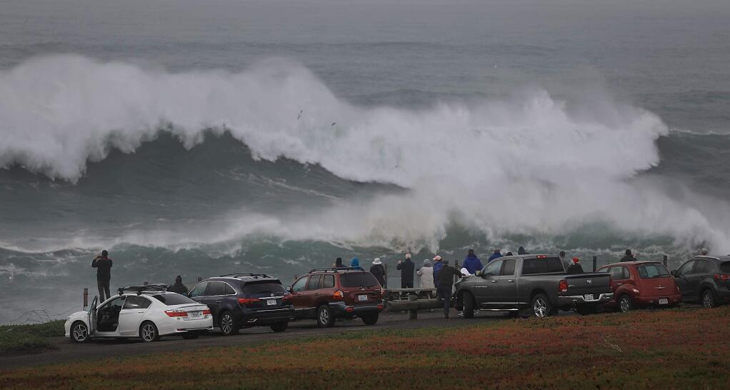 Large waves crash ashore at Duncan's Landing north of Bodega Bay, Monday, Dec. 17, 2018, as a large swell train arrive on the Sonoma Coast. (Kent Porter/The Press Democrat)