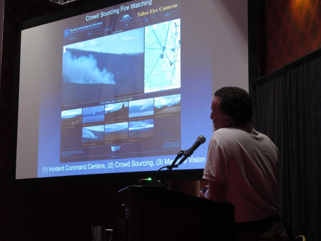 FILE - In this April 20, 2016, file photo, Nevada Seismological Laboratory Director Graham Kent speaks in Reno, Nev., about how cameras serving as virtual fire lookouts at Lake Tahoe utilize an existing earthquake monitoring network to help with early detection of lightning strikes and wildfires. The Nevada Seismological Lab is keeping a close eye on a swam of dozens of small earthquakes that have been recorded in recent days in Sun Valley north of Reno and a larger one earlier this month south of Reno. Lab Director Graham Kent says a sequence of 60 earthquakes that began in Sun Valley early Wednesday, June 19, 2019, were too small to be felt. But he says swarms like this have a history of both subsiding and escalating. (AP Photo/Scott Sonner, File)