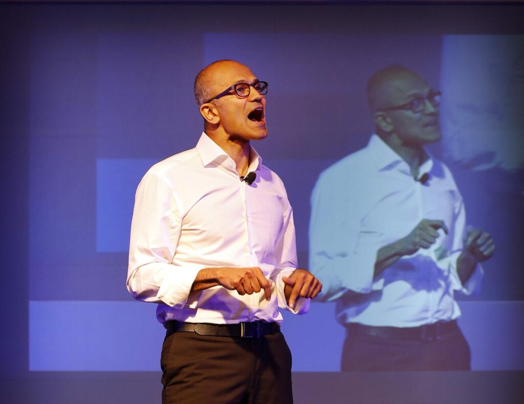 In this Tuesday, Sept. 30, 2014, file photo, Microsoft CEO Satya Nadella speaks to students at the Talent India 2014 program in New Delhi. Nadella's foot-in-mouth statement that women shouldn't ask for raises echoed throughout the tech industry and beyond Thursday, Oct. 9, 2014, earning him quick derisions on social media and leading to a later apology. (AP Photo/Manish Swarup, File)