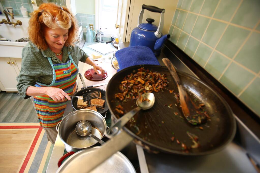 10/9/2013: D1:PC: Kay Baumhefner prepares a fall feast of squash soup and porcini mushroom grilled cheese sandwich at her home in Petaluma on Tuesday, September 24, 2013. (Conner Jay/The Press Democrat)