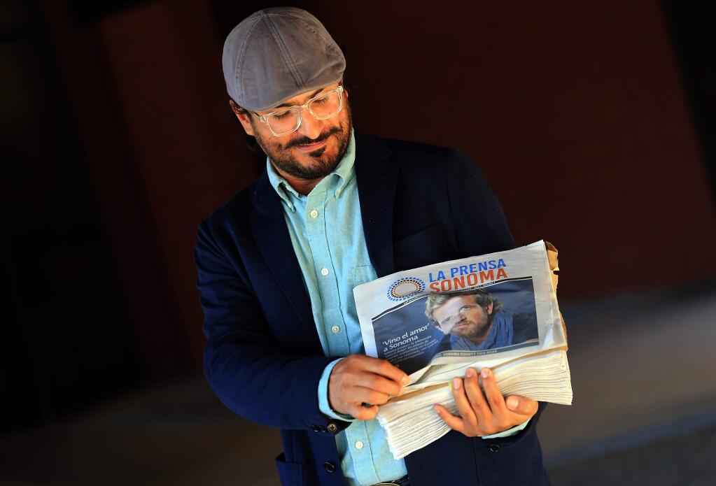 La Prensa Sonoma Editor Ricardo Ibarra with the first print edition of the Sonoma Media Investments monthly Spanish-language newspaper. (John Burgess/The Press Democrat)