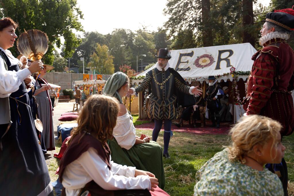 Lord Sussex, performed by Bob Collier, center, greets members of Her Majesty's court and residents of Fenford during the Much Ado About Sebastopol Renaissance Faire in Sebastopol, California on Sunday, September 27, 2015. (Alvin Jornada / The Press Democrat)