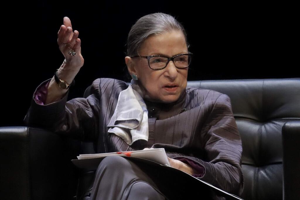 FILE - In this Oct. 21, 2019, file photo, U.S. Supreme Court Justice Ruth Bader Ginsburg gestures while speaking during the inaugural Herma Hill Kay Memorial Lecture at the University of California at Berkeley, in Berkeley, Calif. The Supreme Court says Ginsburg has been hospitalized after experiencing chills and fever. In a statement Saturday, Nov. 23, the court‚Äôs public information office says Ginsburg was admitted Friday night to Johns Hopkins Hospital in Baltimore. (AP Photo/Jeff Chiu, File)