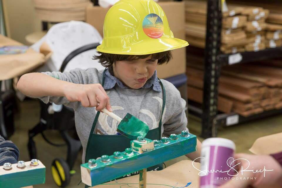 One of many menorah-builders who participated in a Dec. 10 workshop at OSHPHOTOS BY Sherri Stein Rieck
