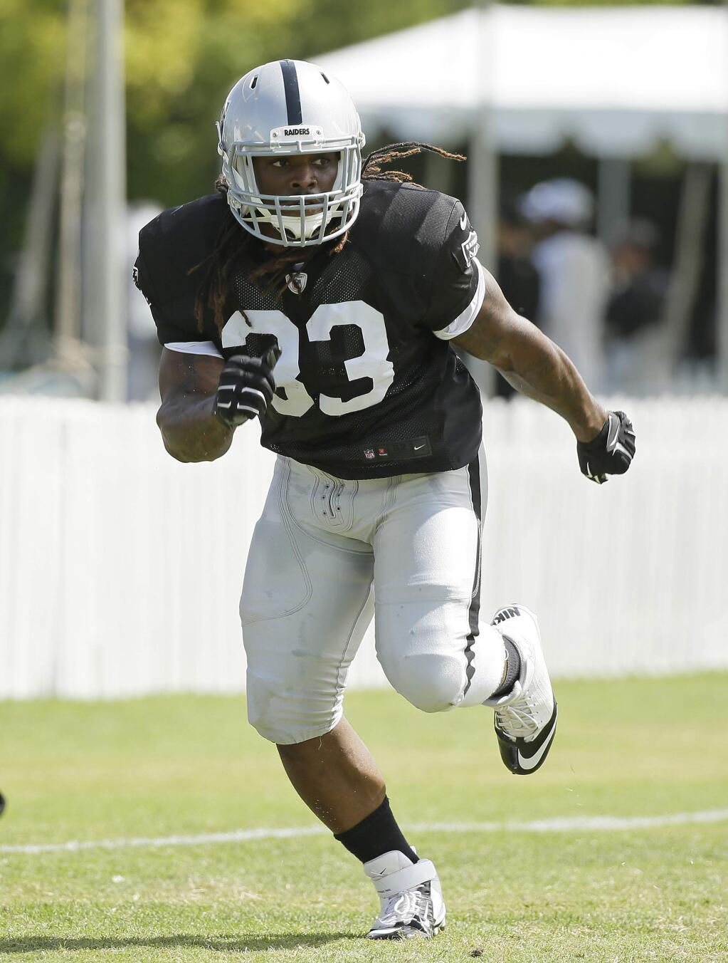 Oakland Raiders running back Trent Richardson runs to catch a pass during their football training camp Thursday, Aug. 6, 2015, in Napa, Calif. (AP Photo/Eric Risberg)