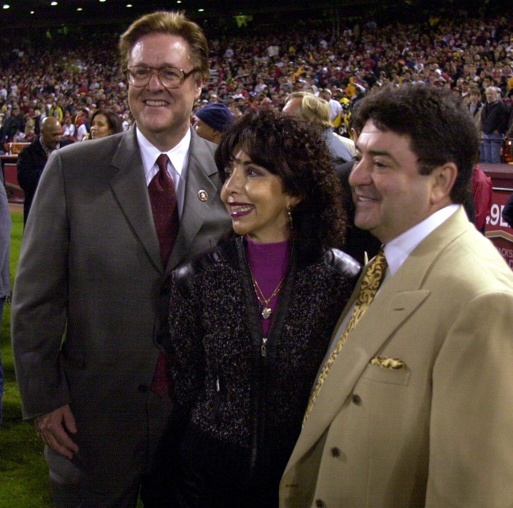 San Francisco 49ers John York, Denise DeBartolo and Eddie Debartolo during the retirement of Joe Montana's number in December of 2003.