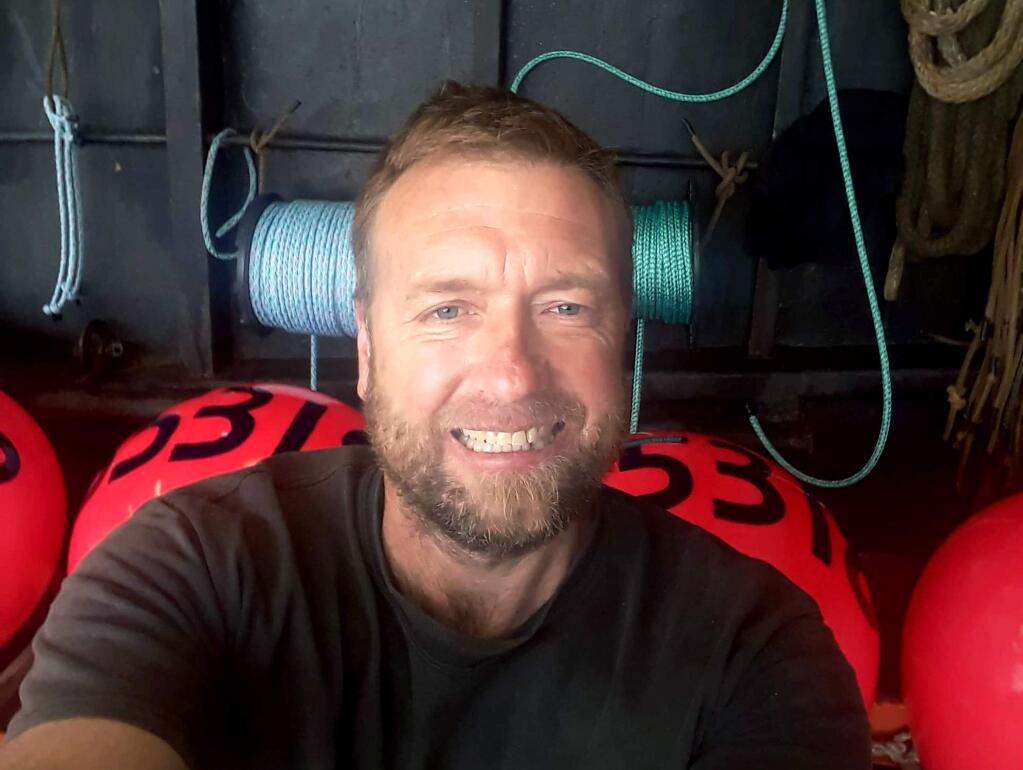 In this photo provided by Ashley Boggs, Boggs' fiance Brock Rainey, a crew member on the Scandies Rose, smiles in a selfie. The U.S. Coast Guard has called off the search for five crew members, including Rainey, of the crab fishing vessel that sank New Year's Eve off Alaska. The decision came after the service said it had exhausted all leads and considered the chances for survival. (Brock Rainey/Courtesy of Ashley Boggs via AP)