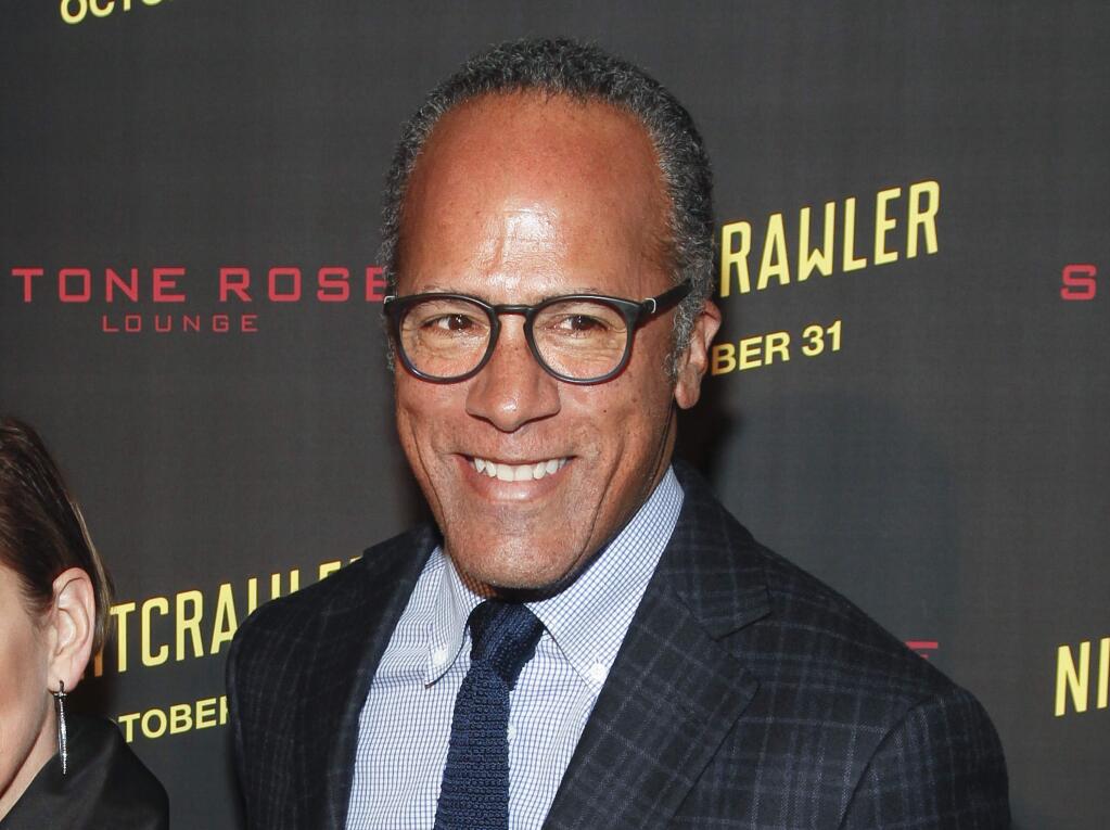 FILE - In this Oct. 27, 2014 file photo, Lester Holt attends the New York premiere of 'Nightcrawler' in New York. While Lester Holt's ascension to full-time anchor of NBC's 'Nightly News' came as a result of Brian Williams' stunning downfall, no one can say he hasn't worked hard to take advantage of an opportunity. The California-born Holt becomes the first African-American to be sole anchor of a network evening newscast. (Photo by Andy Kropa/Invision/AP, File)