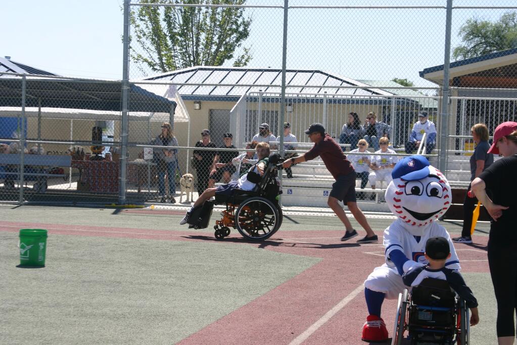 Helping to build the Miracle League ballfield was a recent joint effort from Petaluma’s Rotary clubs. (PHOTO BY BOB TUTTLE)