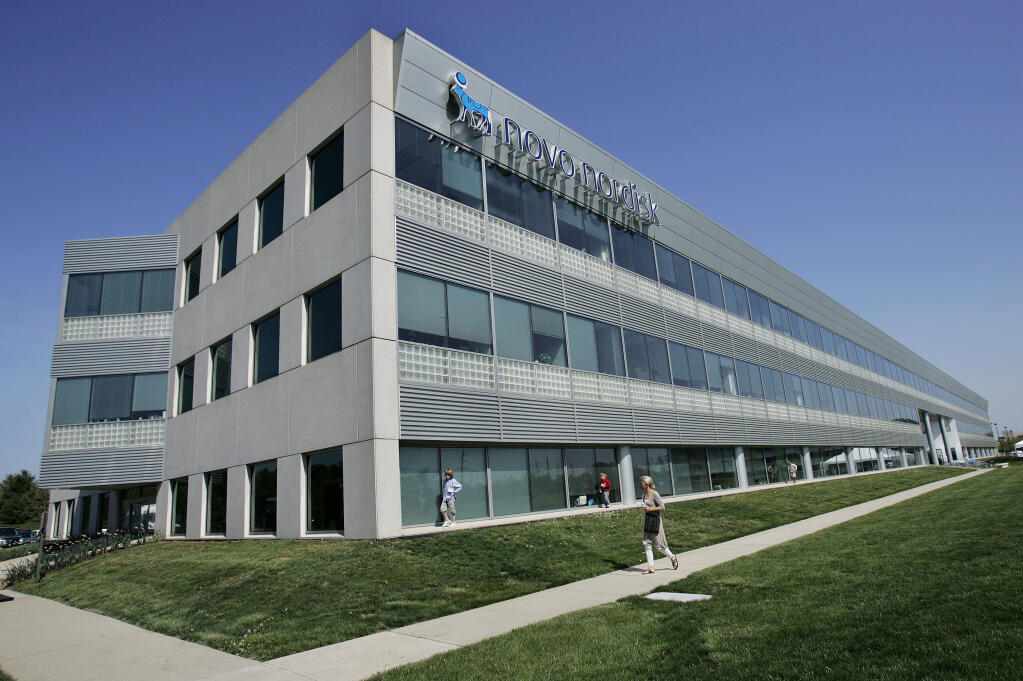 FILE- This April 24, 2008, file photo shows the former North American headquarters of Novo Nordisk, Inc., in Plainsboro, N.J. Novo Nordisk will start slashing some U.S. insulin prices up to 75% next year, following a path set earlier this month by rival Eli Lilly. The Danish drugmaker said Tuesday, March 14, 2023 that pre-filled pens and vials of long- and short-acting insulins will see list price reductions. They include Levemir, Novolin, NovoLog and NovoLog Mix70/30. (AP Photo/Mel Evans, File)