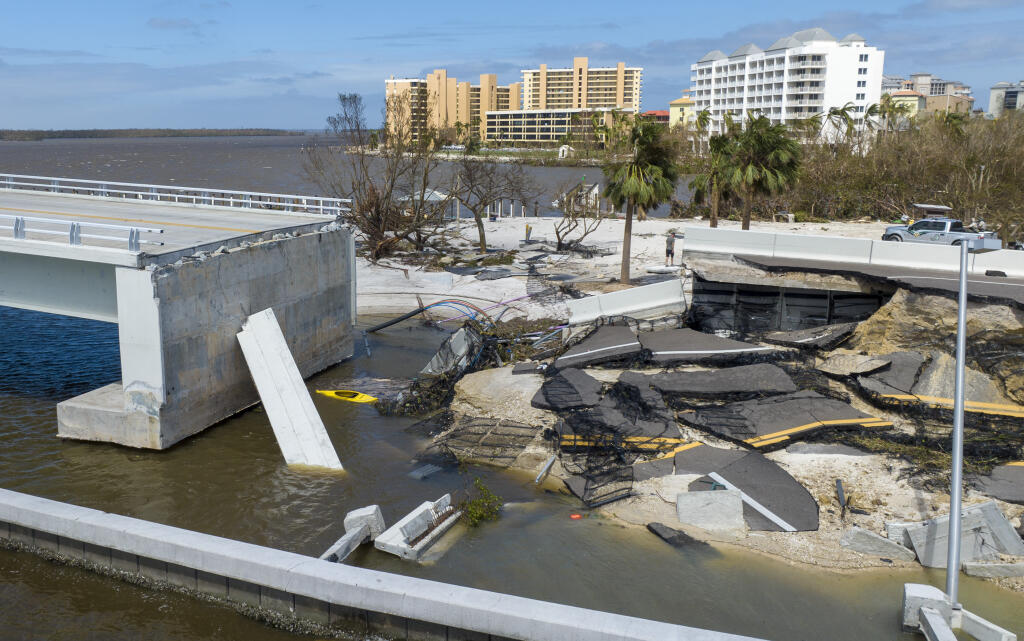A section of the Sanibel Causeway was lost due to the effects of Hurricane Ian, Thursday, Sept. 29, 2022, in Fort Myers, Fla. (AP Photo/Steve Helber)