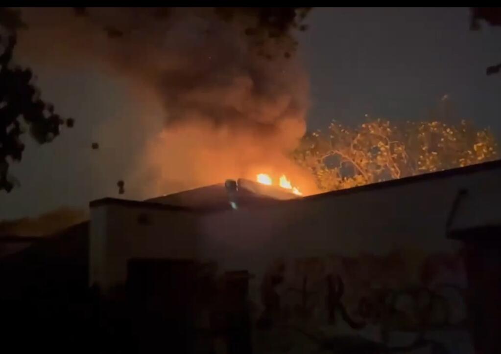 A screenshot from video showing flames from a fire at the closed Bennett Valley Senior Center in Santa Rosa, Thursday, Oct. 20, 2022. (Santa Rosa Fire Department)