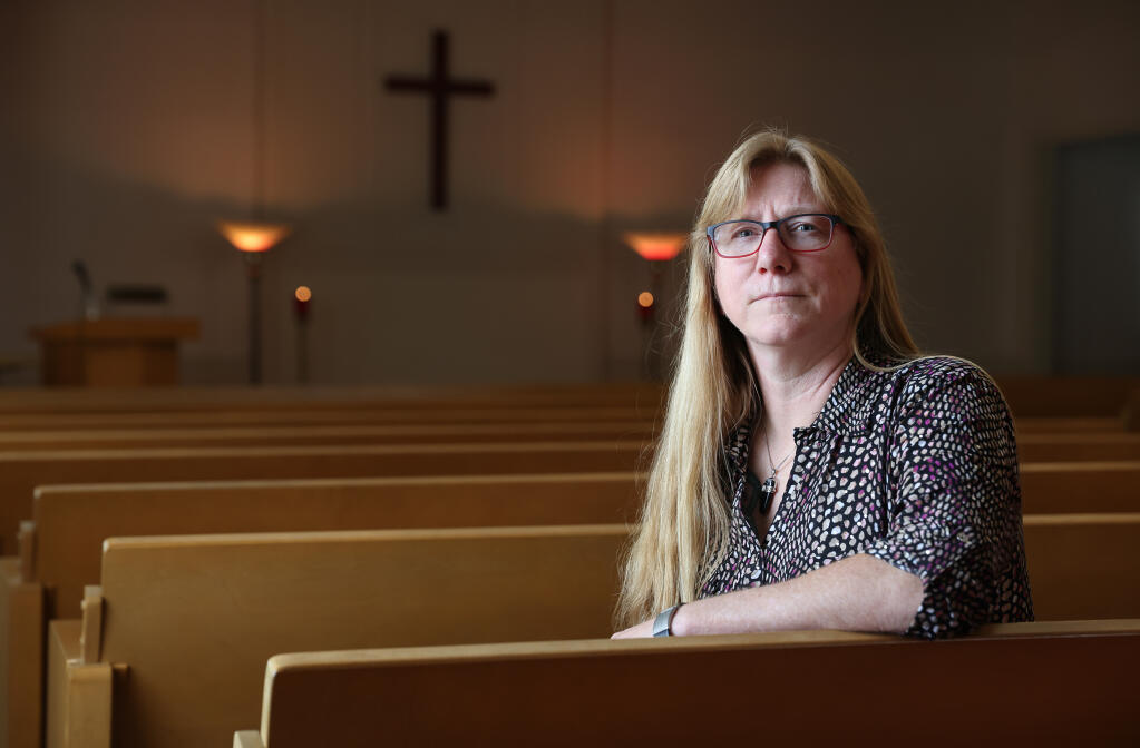 Cari Hays is the funeral director at Lafferty & Smith Colonial Chapel. Throughout the pandemic, Hays had to make adjustments for coronavirus pandemic protocols, while guiding families in their time of grief.  Photo taken in Santa Rosa on Monday, March 14, 2022.  (Christopher Chung/ The Press Democrat)