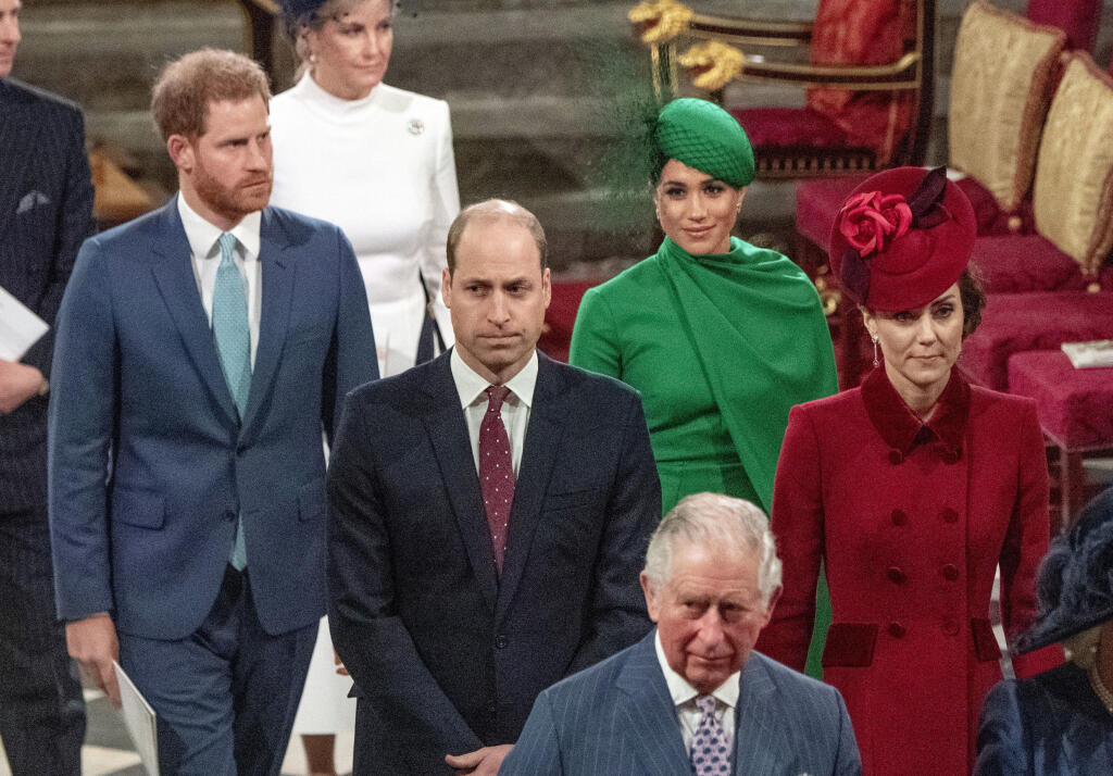 FILE - In this file photo dated Monday March 9, 2020, from back, Britain's Prince Harry and Meghan Duchess of Sussex, Prince William and Kate, Duchess of Cambridge, with Prince Charles, front, as the family members leave the annual Commonwealth Service at Westminster Abbey in London.  Harry and Meghan stepped away from full-time royal life early 2020, and Buckingham Palace on Friday Feb. 19, 2021, confirmed the couple will not be returning to royal duties, and Harry will give up his honorary military titles.(Phil Harris / Pool FILE via AP)