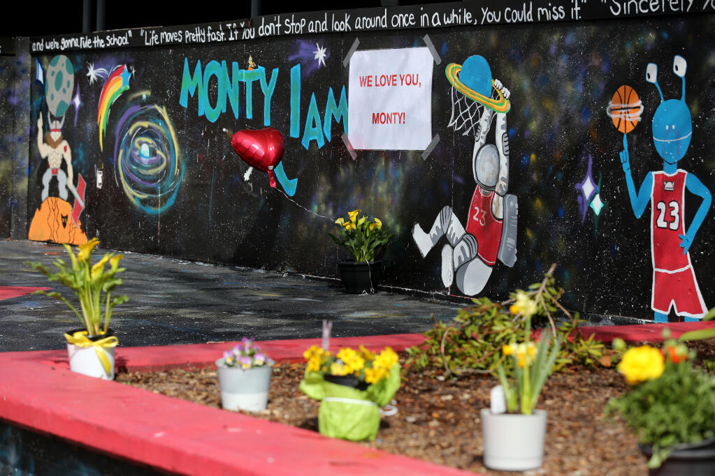 Messages of support, along with balloons and flowers were placed on the quad at Montgomery High School in Santa Rosa, Sunday, March 5, 2023, by members of the community.  (Beth Schlanker/The Press Democrat)