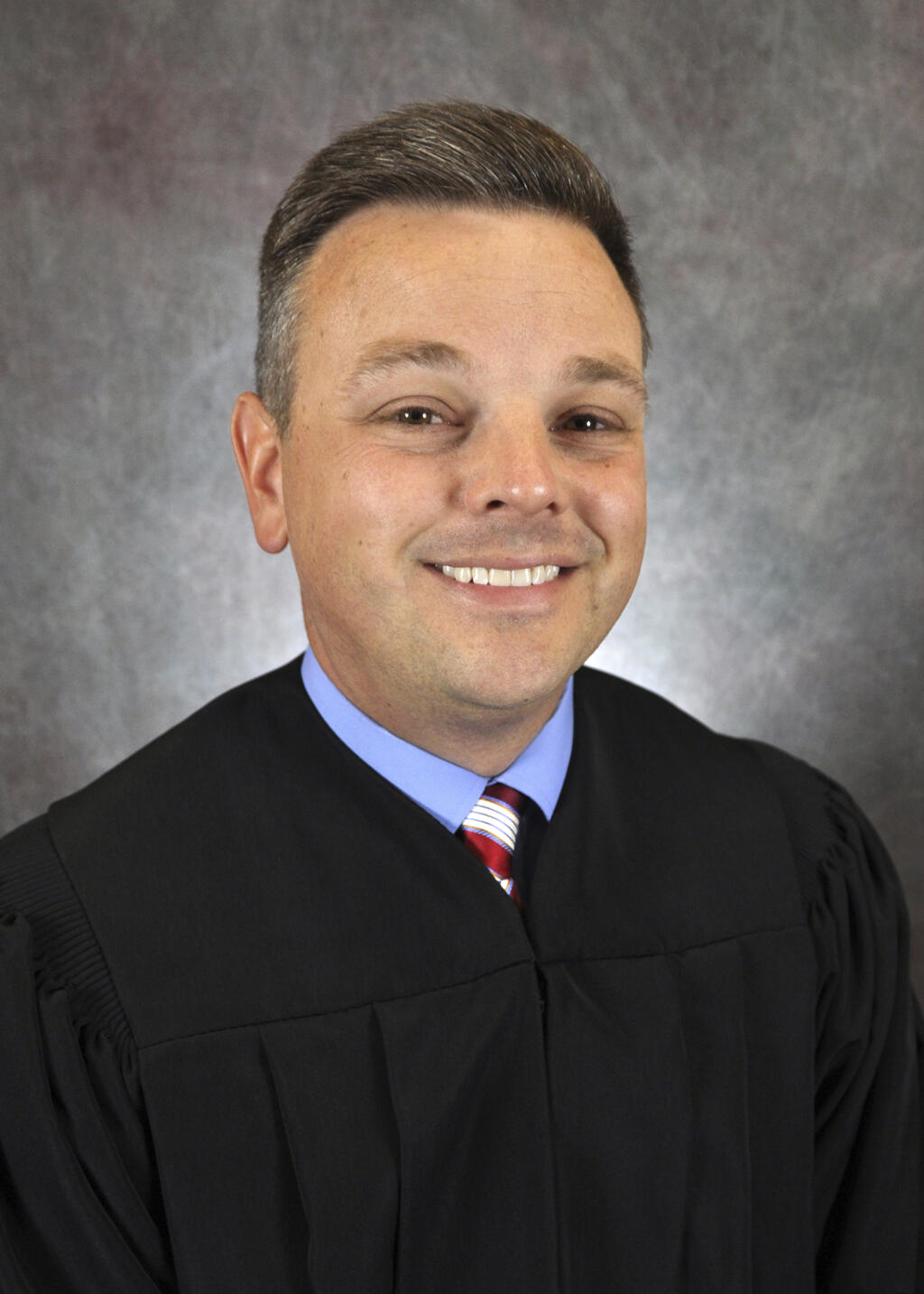 This undated photo provided by the Kentucky Administrative Office of the Courts on Sunday, Dec. 12, 2021 shows District Judge Brian Crick. (Kentucky Administrative Office of the Courts via AP)