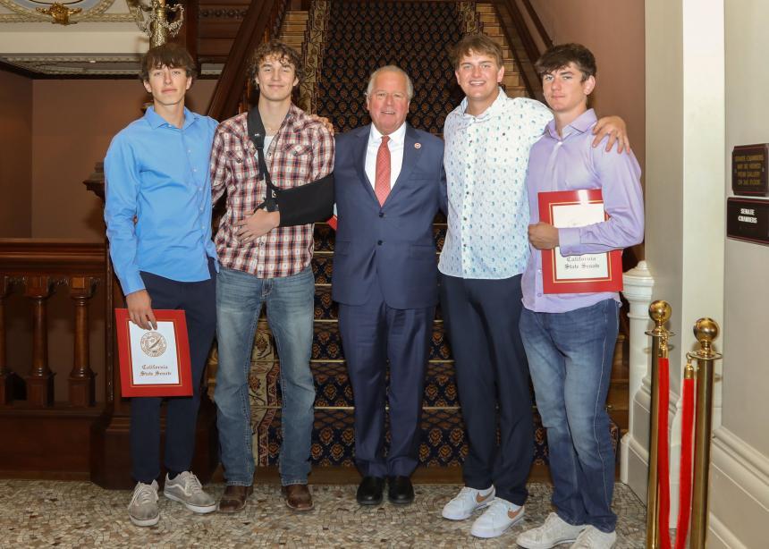 From left, Toby Ford-Monroe, 20, Mikey Serbicki, 16, state Sen. Bill Dodd, D-Napa, Mason Matulaitis, 19, and Nate Jordan, 19, pose Monday in Sacramento after a ceremony recognizing the heroics of Ford-Monroe, Matulaitis and Jordan, who rushed to the aid of Serbicki on June 15 after he suffered a heart attack while playing basketball. All four are residents of Sonoma and graduates of Sonoma Valley High School. (California Senate)
