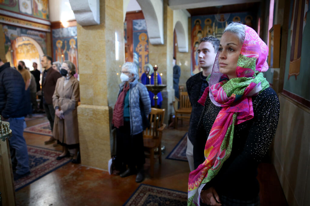Parishioners attend Sunday morning worship service at St. Seraphim of Sarov Orthodox Cathedral in Santa Rosa, California, on Sunday, Feb. 27, 2022. (Beth Schlanker/The Press Democrat)
