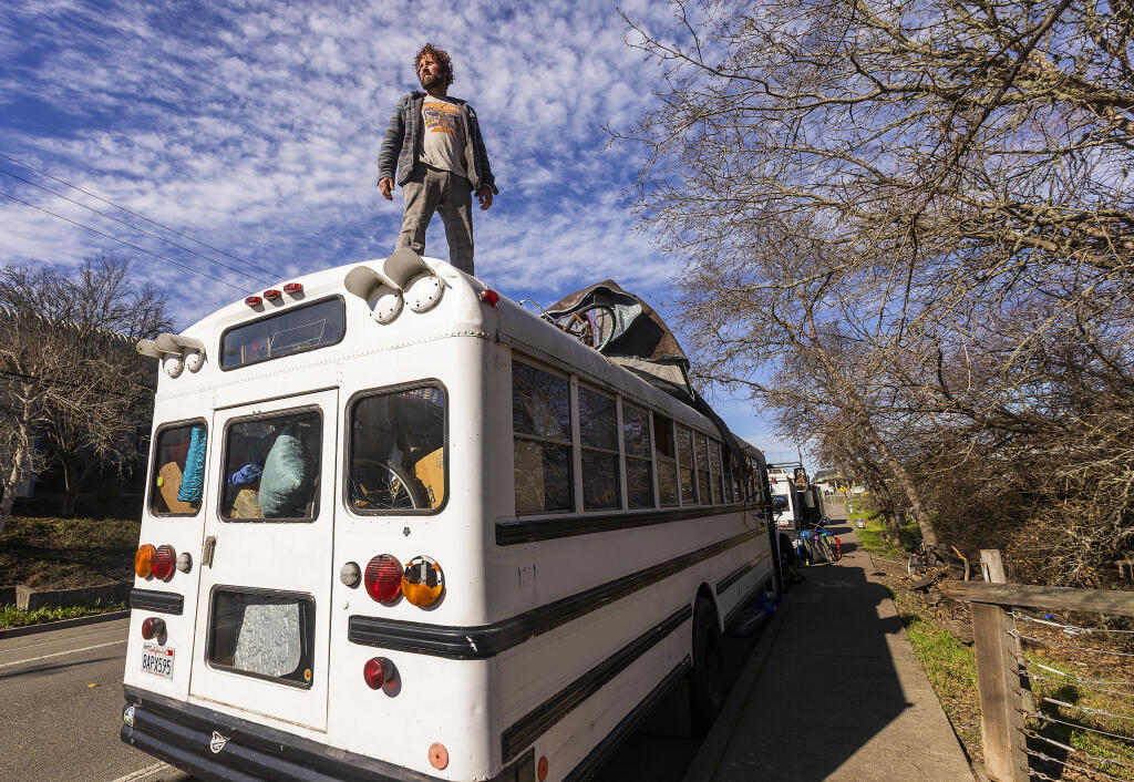 J.D. Gadde is frustrated the city isn’t clear about how to deal with his registration and how often he has to move his bus in an RV homeless camp on Morris Street in Sebastopol on Thursday, January 20, 2022. (Photo by John Burgess/The Press Democrat)
