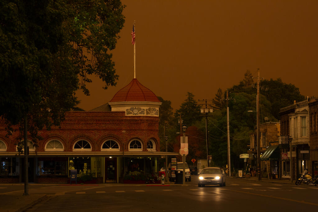 Sonoma turned orange Sept. 9, shown here at the corner of First Street East and East Napa Street, when low lying ash created an amber glow throughout the Bay Area. (Photo by Robbi Pengelly/Index-Tribune)