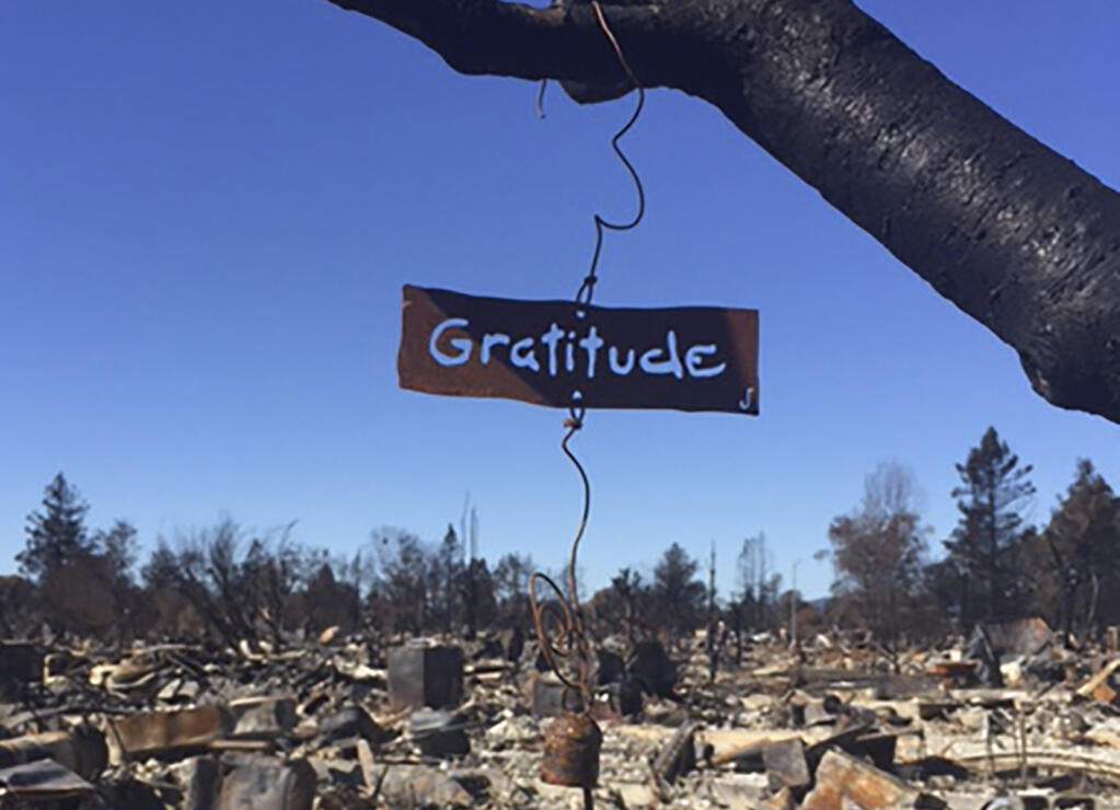 Upon returning the day after the smoke cleared, the homeowner of this house, lost in the 2017 firestorm, found Jenifer Utsch’s “Jendala” wind chime still hanging from the charred cherry tree; a persistent reminder to cherish what is beautiful and feel gratitude.(Photo exclusive permission, Jenifer Utsch ©2020 - cropped)