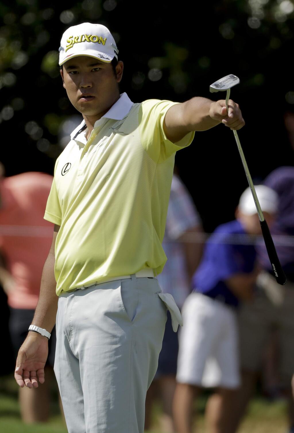 Hideki Matsuyama of Japan, watches his putt on the sixth hole during the third round of the PGA Championship golf tournament at the Quail Hollow Club Saturday, Aug. 12, 2017, in Charlotte, N.C. (AP Photo/Chris O'Meara)